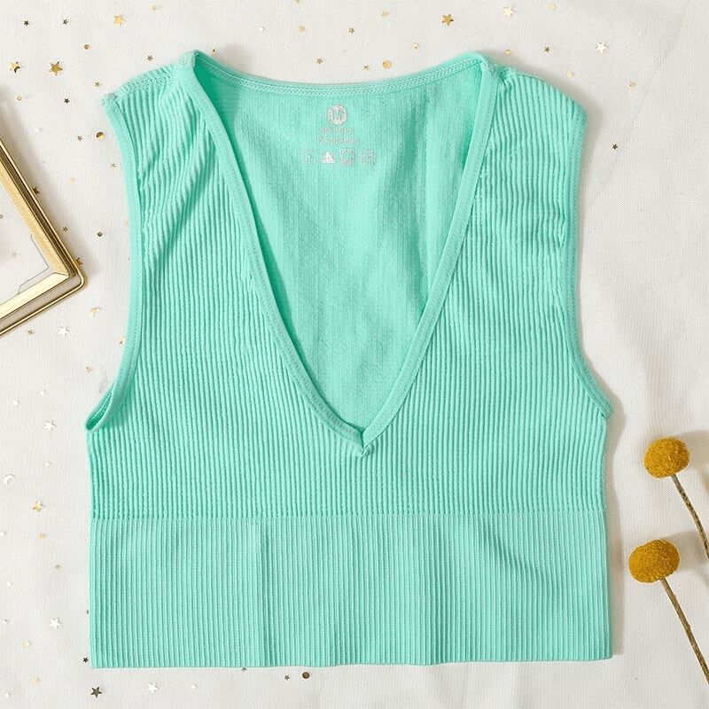 Mint green ribbed seamless V-neck tank top for women, perfect for yoga or sport. Breathable and stretchy polyester-spandex blend.
